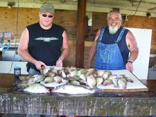 Scott and Larry after our two hours of fishing the Waconda Lake damn with 54 Crappie, 2 white bass and 1 Walleye.